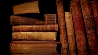 stock-footage-ancient-books-in-a-bookshelf